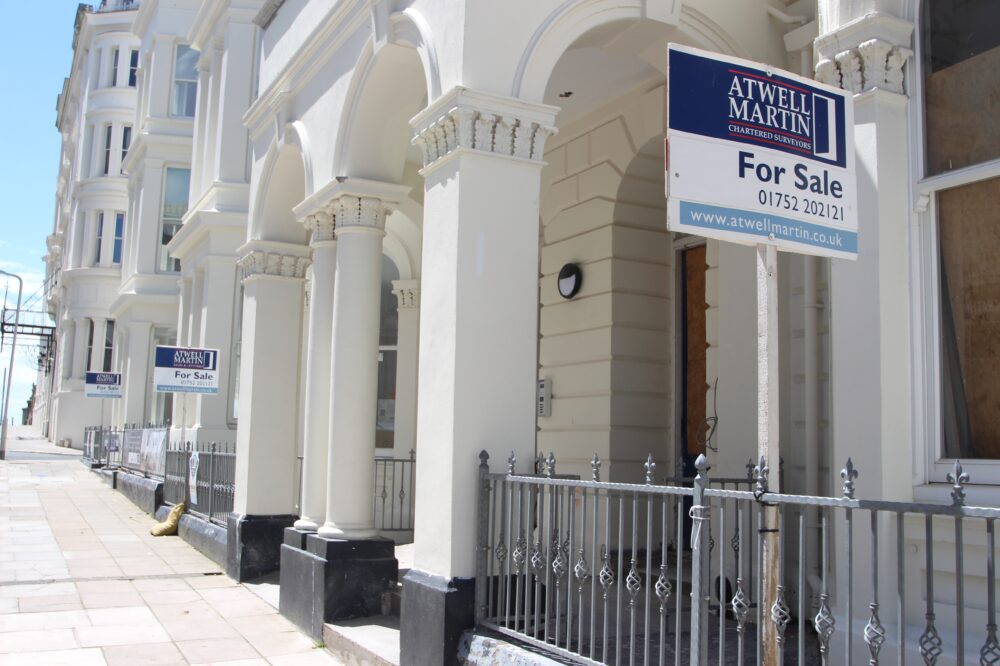 Houses with for sale signs from Atwell Martin estate agents Plymouth